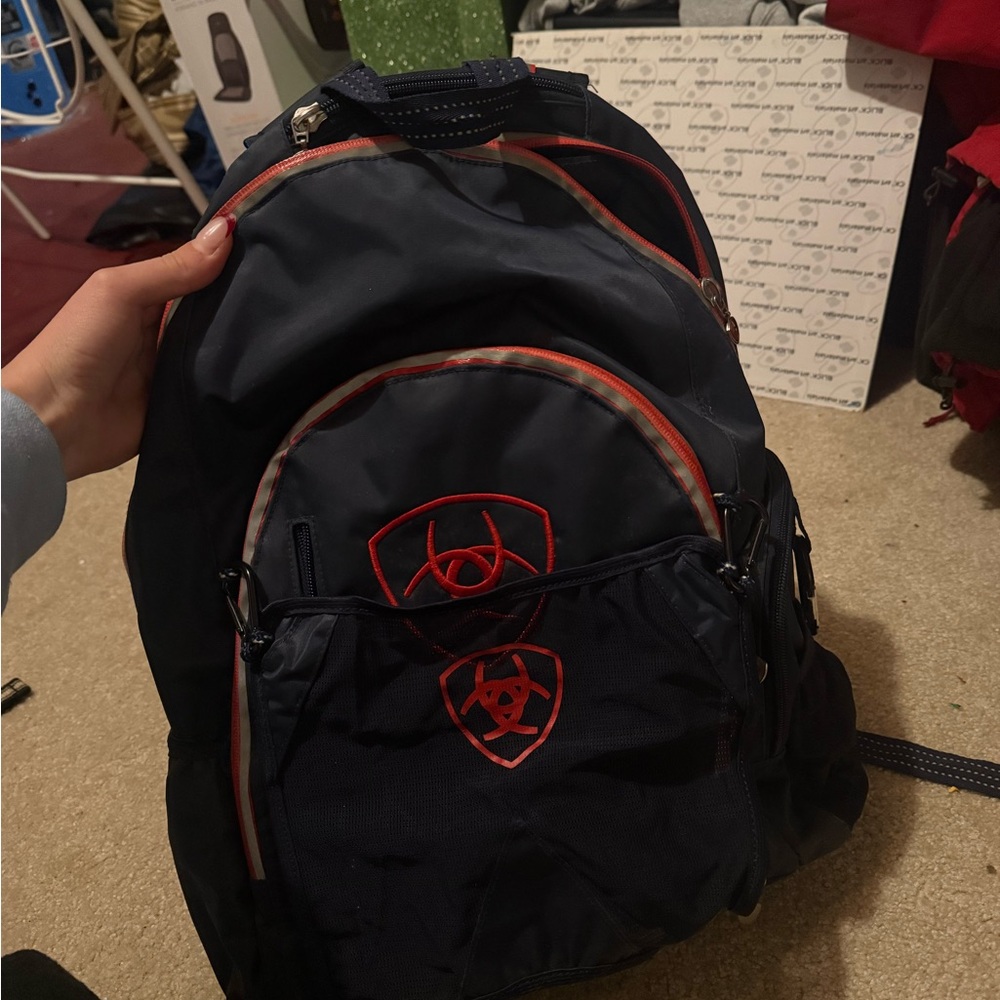 Navy Blue Backpack with Red Accents